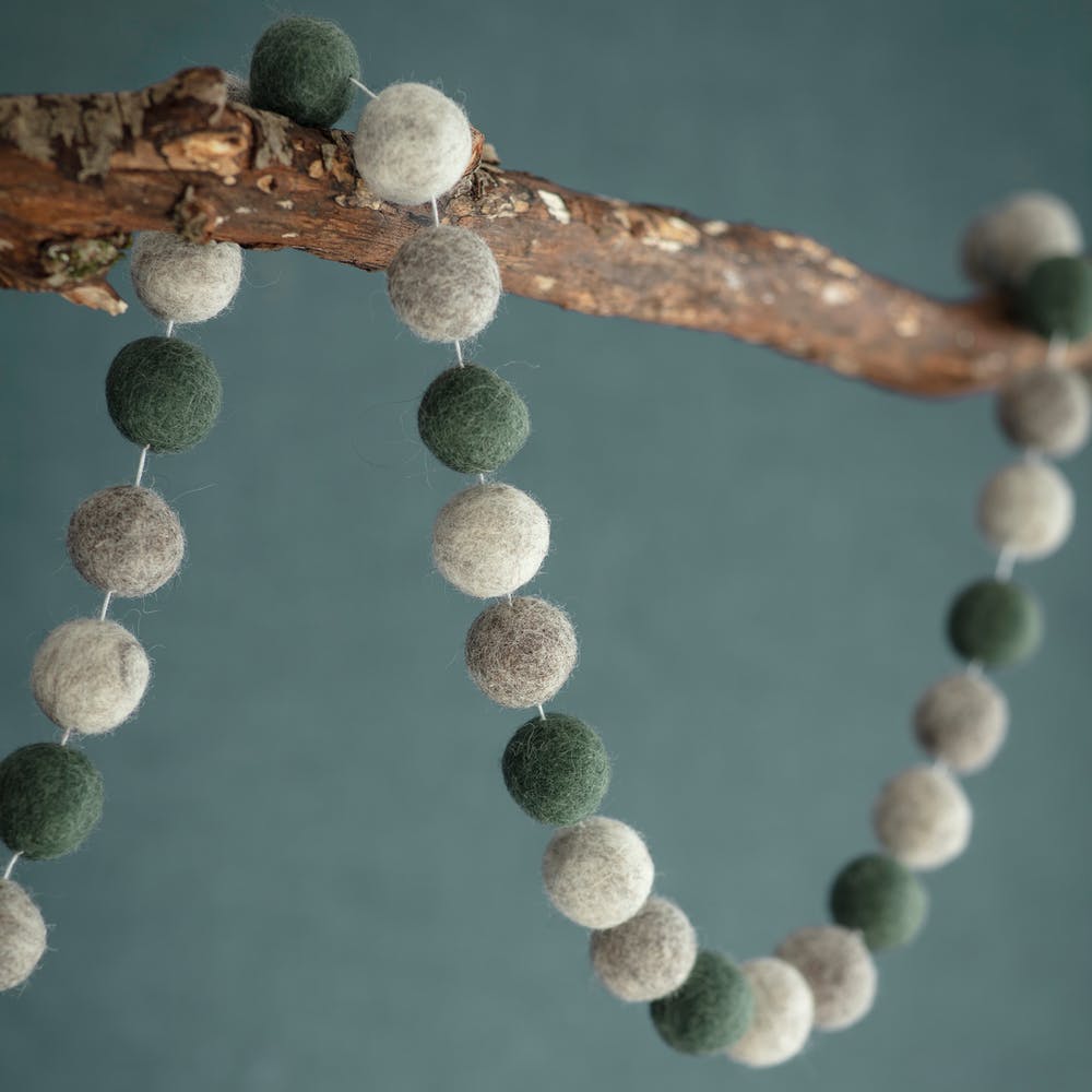 Southwold Pom Pom Garland in Forest Green